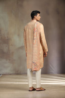 Peach Pashmina Silk Kurta Set with elegant print and flowing dupatta.