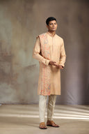 Peach Pashmina Silk Kurta Set with elegant print and flowing dupatta.