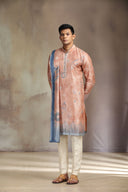 Rust Silk Kurta Set with an elegant mix of print and embroidery.