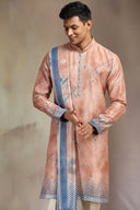 Rust Silk Kurta Set with an elegant mix of print and embroidery.