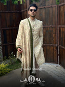 Sahil Anand radiates royal charm in our cream raw silk embroidered sherwani with dupatta and churidar