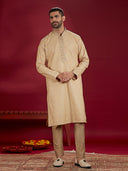 Olive Jacquard Rubelli Kurta Paired with an Olive Colour Chudidar.