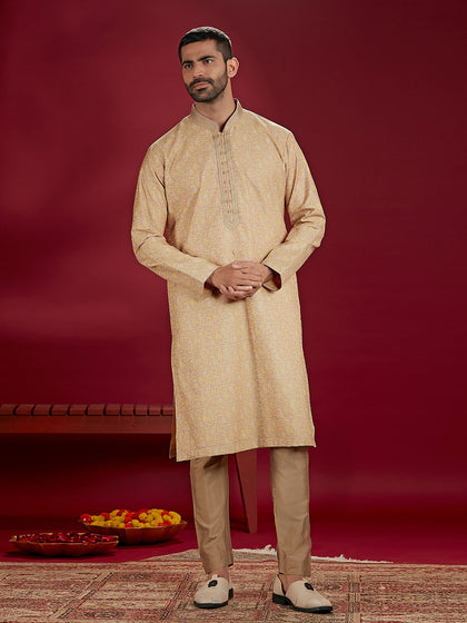 Beige Jacquard Rubelli Kurta Paired with an Olive Colour Aligarhi.