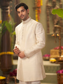 Muhurtham set with cream Raw Silk hand highlight work on Sherwani, and Dhoti - KORANM