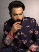 Blue Jodhpuri and Kurta with Resham and Zari ThreadWork with Gold Highlights Paired with Blue Aligadi Pant.