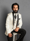 Cream satin tuxedo paired with black trousers for a timeless formal look