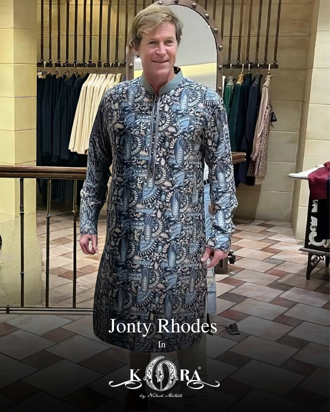 Cricketer Jonty Rhodes brings effortless charm in our teal blue muslin digital silk kurta with embroidery and print.