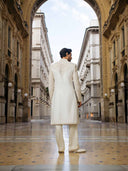 Back view of cream silk sherwani set for men with embroidery