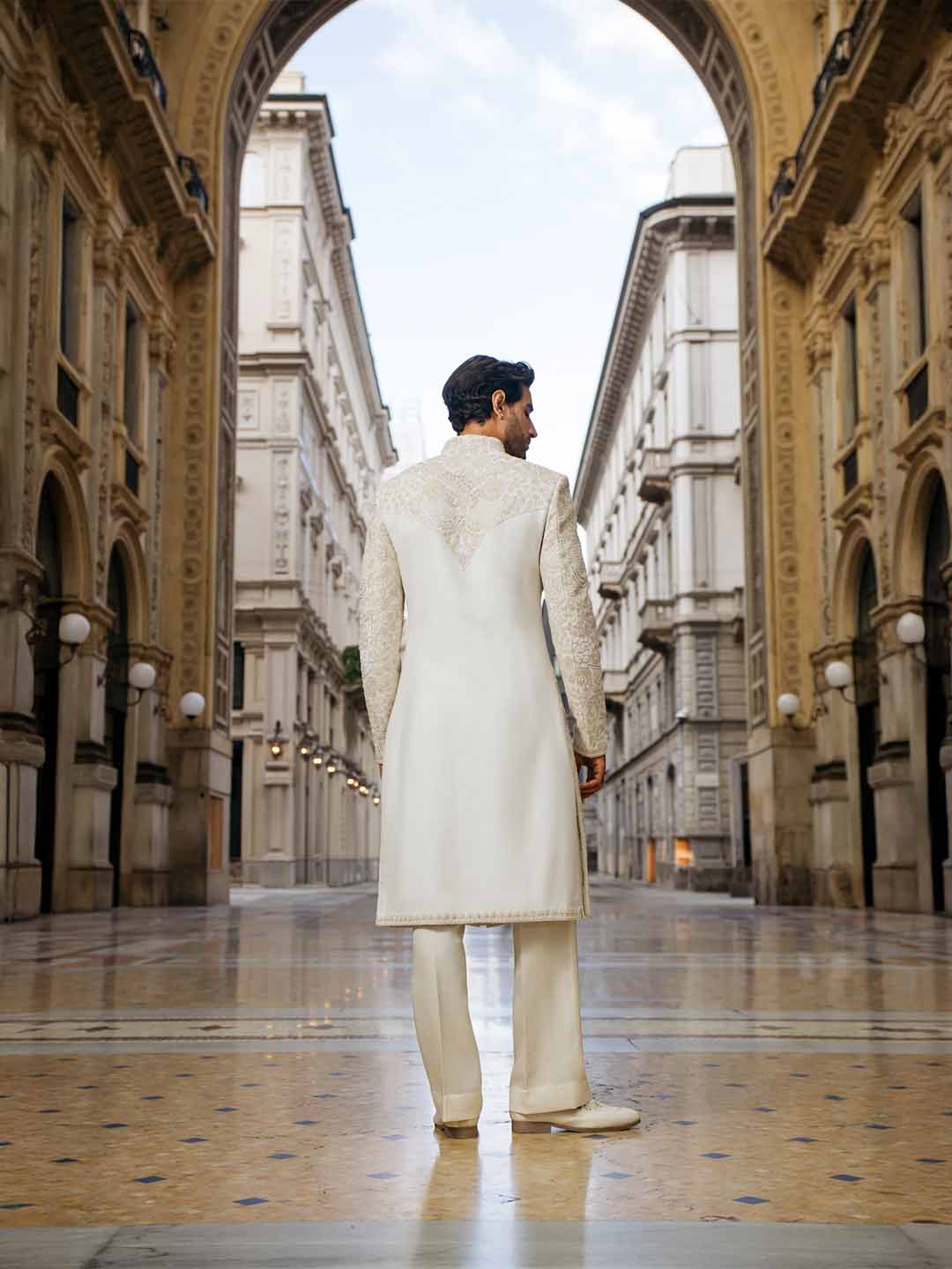 Back view of cream silk sherwani set for men with embroidery