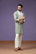 Pista Linen Embroidered Kurta with Whit Cream Plazzo Pants for Men - KORANM