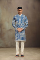 Blue Silk kurta set with a refined blend of print and embroidery.