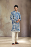 Blue Silk kurta set with a refined blend of print and embroidery.