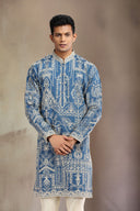 Blue Silk kurta set with a refined blend of print and embroidery.