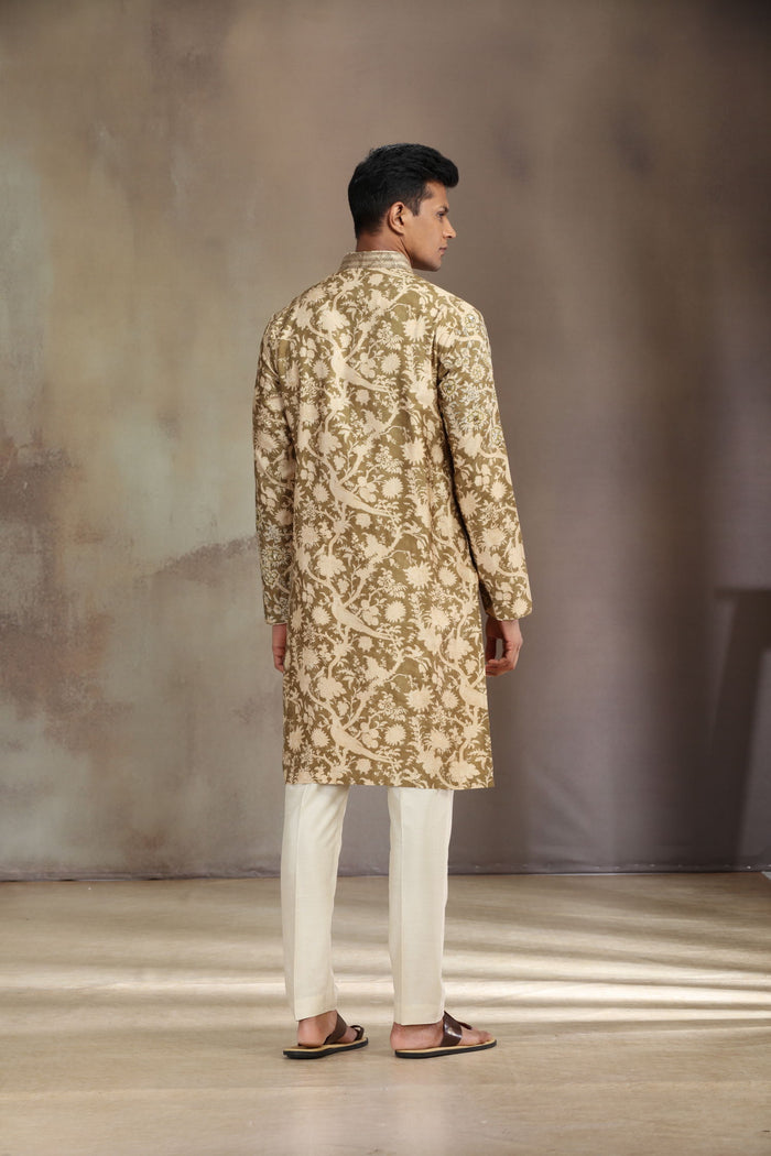 A mustard silk kurta set with a stylish blend of print and intricate embroidery. - KORANM