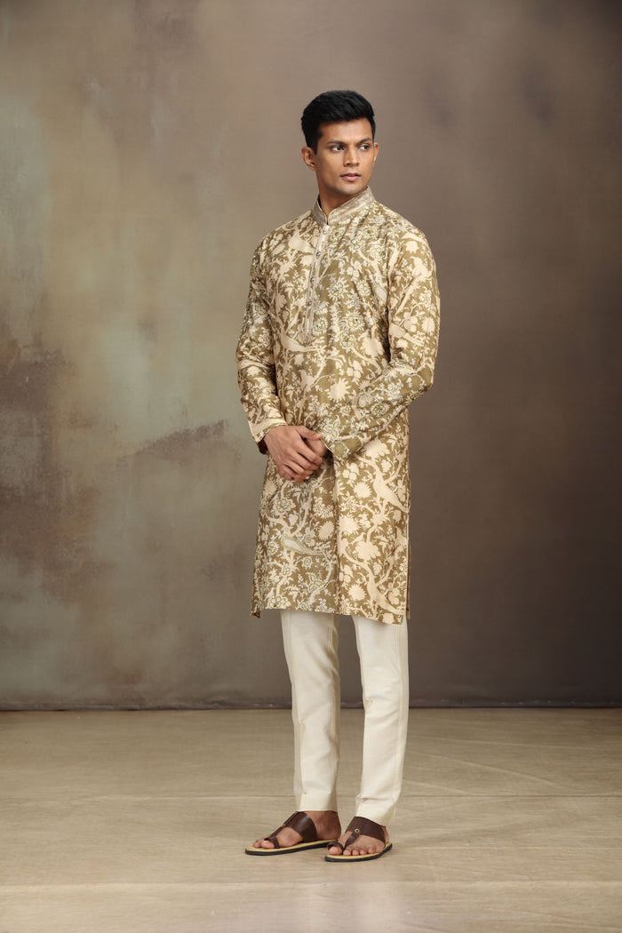 A mustard silk kurta set with a stylish blend of print and intricate embroidery. - KORANM