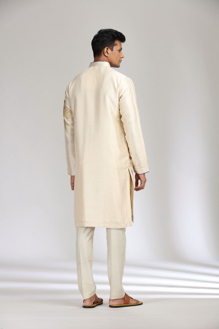 Beige Tussar Silk kurta set with a tasteful blend of print and embroidery. - KORANM