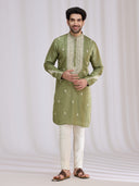Styled mehendi look of olive green nysaa kurta set for men with aligarhi