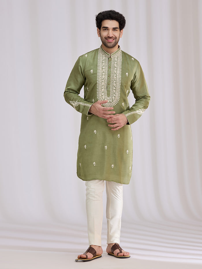 Styled mehendi look of olive green nysaa kurta set for men with aligarhi