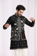 Close-up of geometric embroidery with resham thread work on black satin linen bandi jacket