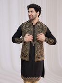 Styled engagement look of black blended silk bandi jacket set for men with kurta and antique gold aligarhi