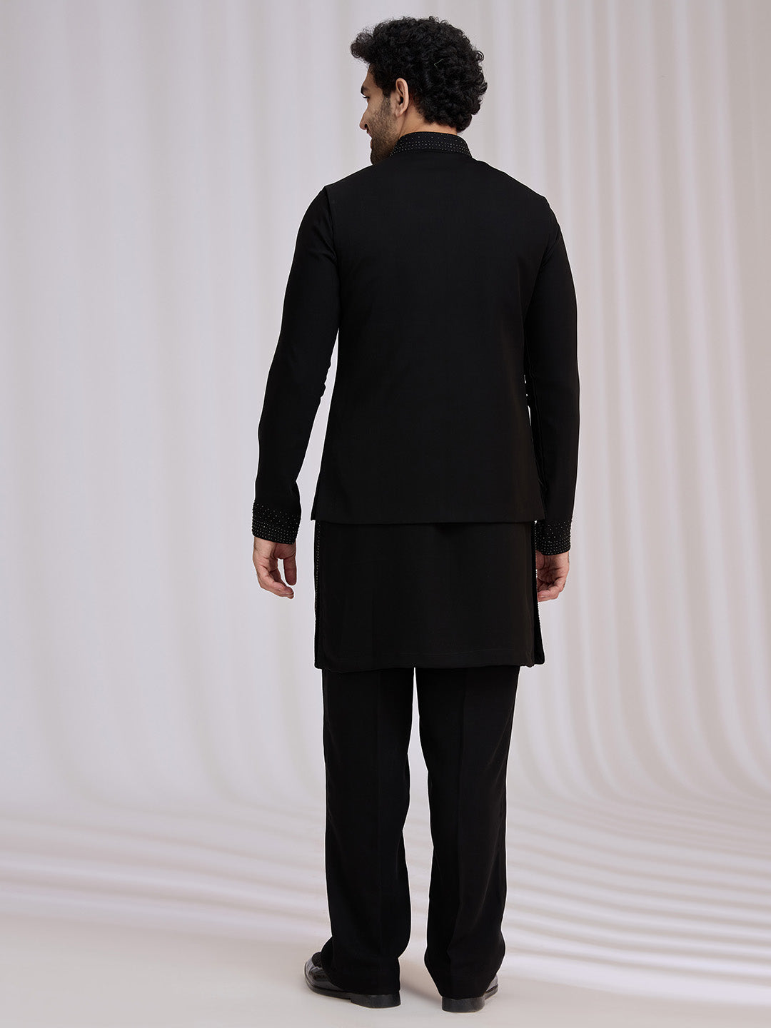 Back view of black terry rayon bandi jacket set for men