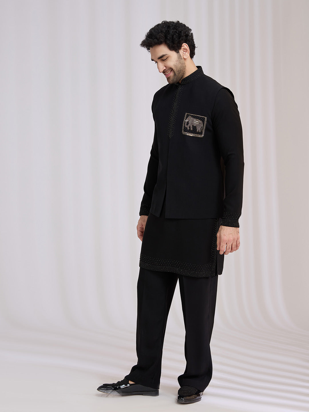 Side view of black terry rayon bandi jacket for men with animal embroidery