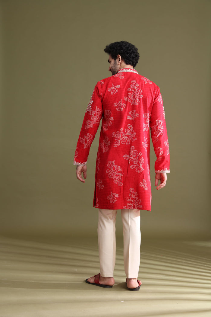 Back view of red blended silk floral kurta set for men