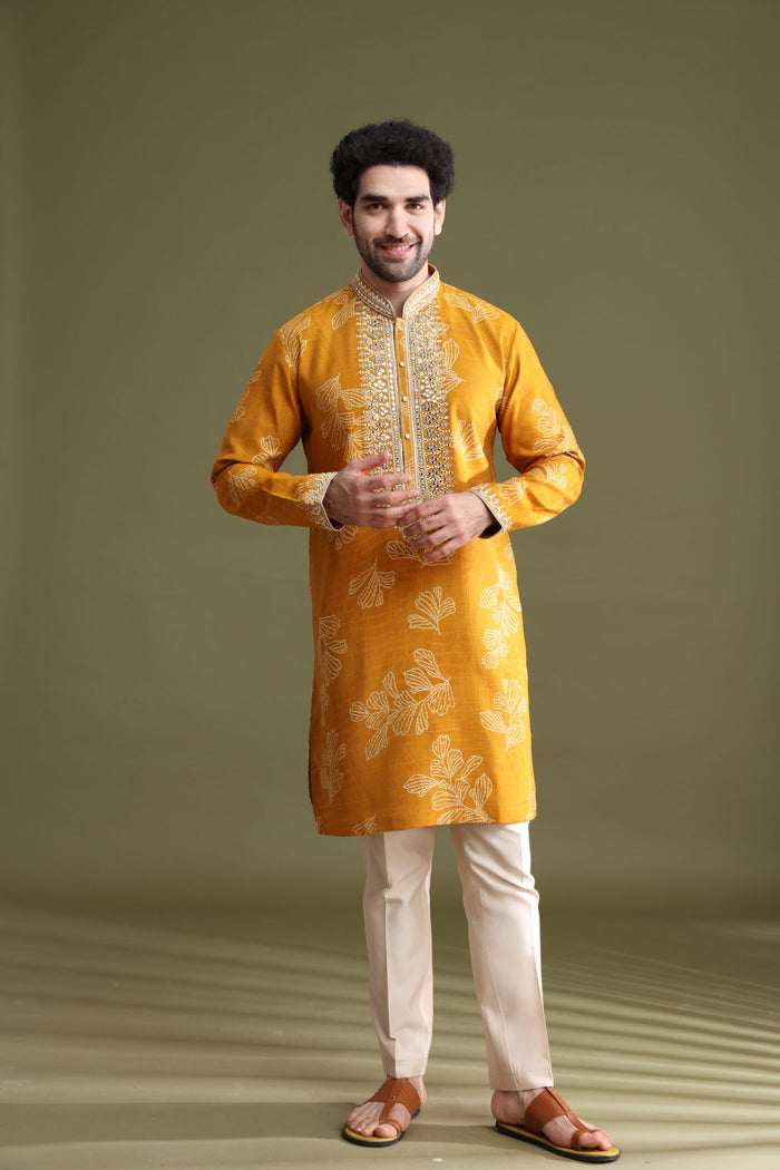 Styled haldi look of mustard blended silk floral kurta set for men with aligarhi