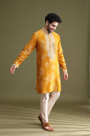Side view of mustard blended silk floral kurta set for men