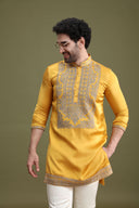 Yellow satin linen kurta set for men with cream aligarhi and dori embroidery – front view