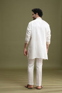 Back view of white short kurta pant set for men