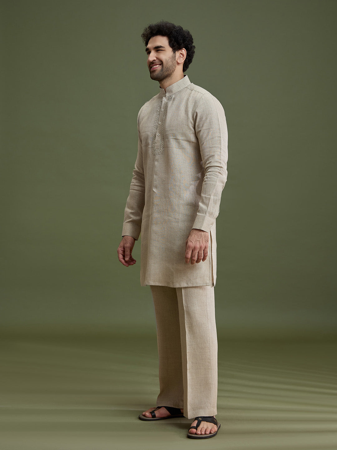 Side view of khaki linen silk kurta for men with mandarin collar and dori embroidery