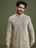 Close-up of dori embroidery on khaki linen silk kurta for men