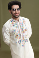 Close-up of hand embroidery and resham thread work on cream blended silk kurta for men