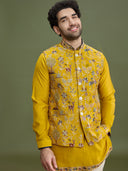 Styled haldi look of yellow floral bandi jacket set for men