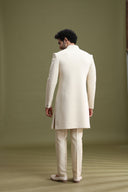 Back view of cream Lucknowi Indo-Western sherwani set for men