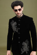 Black bomario silk jodhpuri set for men with animal embroidery and metal embellishment – front view