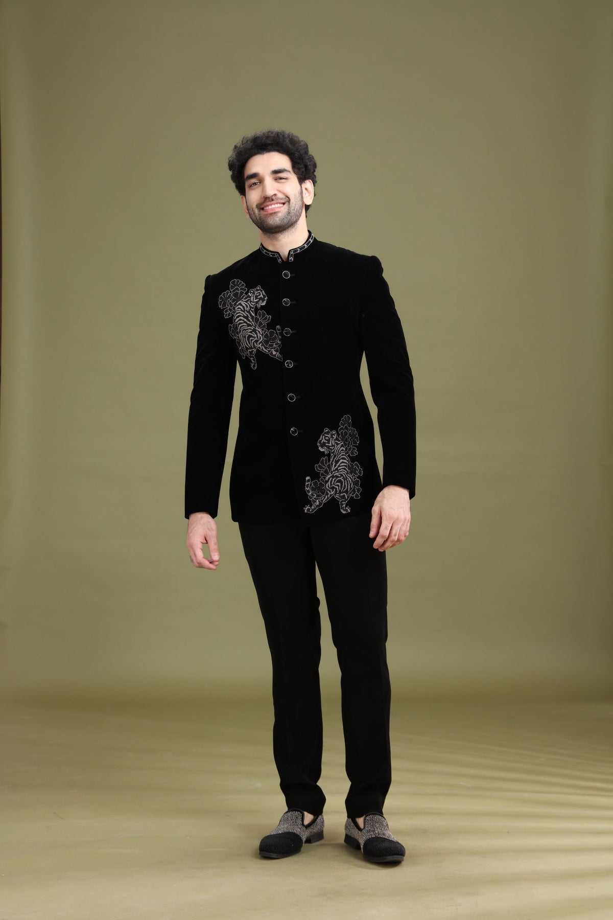 Styled reception look of black bomario silk jodhpuri set for men