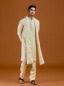 Pista satin linen blend kurta set featuring delicate thread embroidery and a coordinated pista bottom.