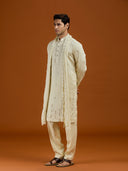 Pista satin linen blend kurta set featuring delicate thread embroidery and a coordinated pista bottom.