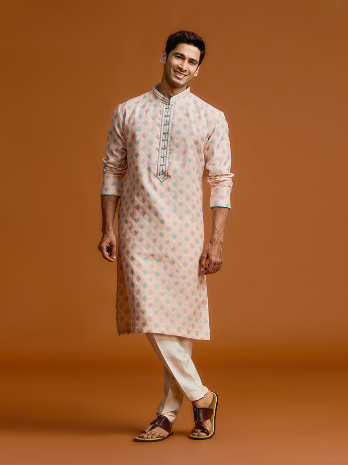 Peach silk-jacquard kurta set with all-over geometric diamond print, paired with a cream bottom. - KORANM