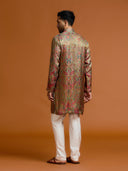 Olive Jamawar kurta, paired with a white bottom.