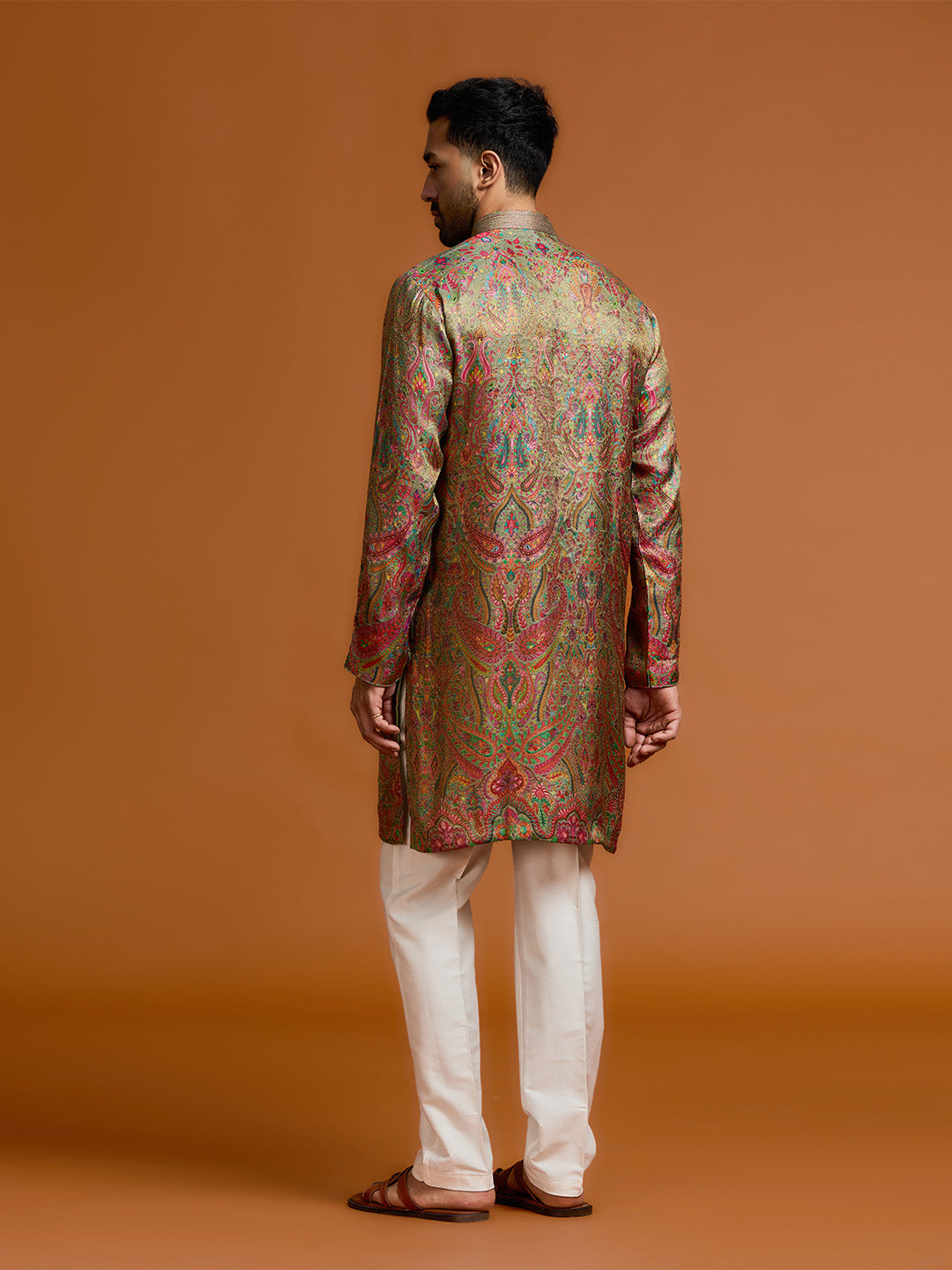 Olive Jamawar kurta, paired with a white bottom. - KORANM
