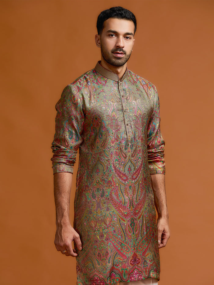 Olive Jamawar kurta, paired with a white bottom. - KORANM