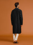 Elegant Black Silk Kurta Featuring Mirror-Work Embroidery Paired with White Bottoms. - KORANM