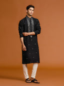 Elegant Black Silk Kurta Featuring Mirror-Work Embroidery Paired with White Bottoms. - KORANM