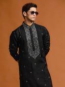 Elegant Black Silk Kurta Featuring Mirror-Work Embroidery Paired with White Bottoms. - KORANM