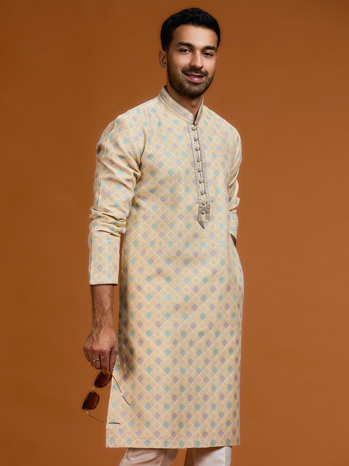 Fawn jacquard silk kurta with geometric print, paired with cream Aligarhi pants. - KORANM