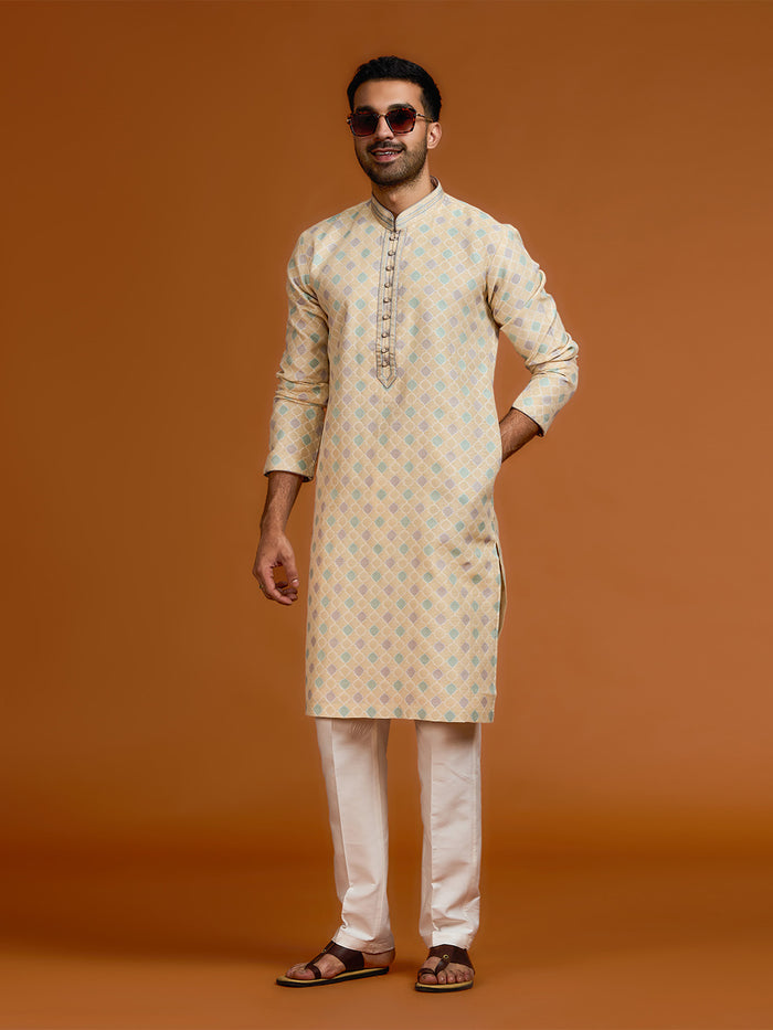 Fawn jacquard silk kurta with geometric print, paired with cream Aligarhi pants. - KORANM