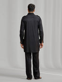 Black silk kurta set with subtle matching embroidery, paired with black bottoms. - KORANM